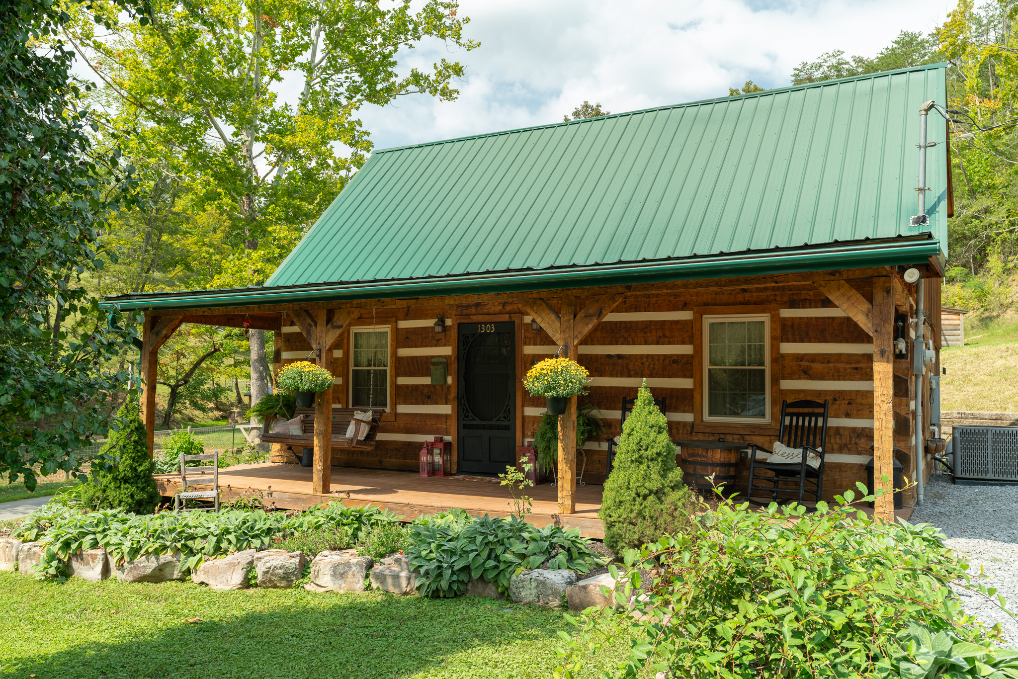Monarch Realty cabin listing under 400k with investment potential in the Smoky Mountain tourism market represented by broker Penny Cowell.